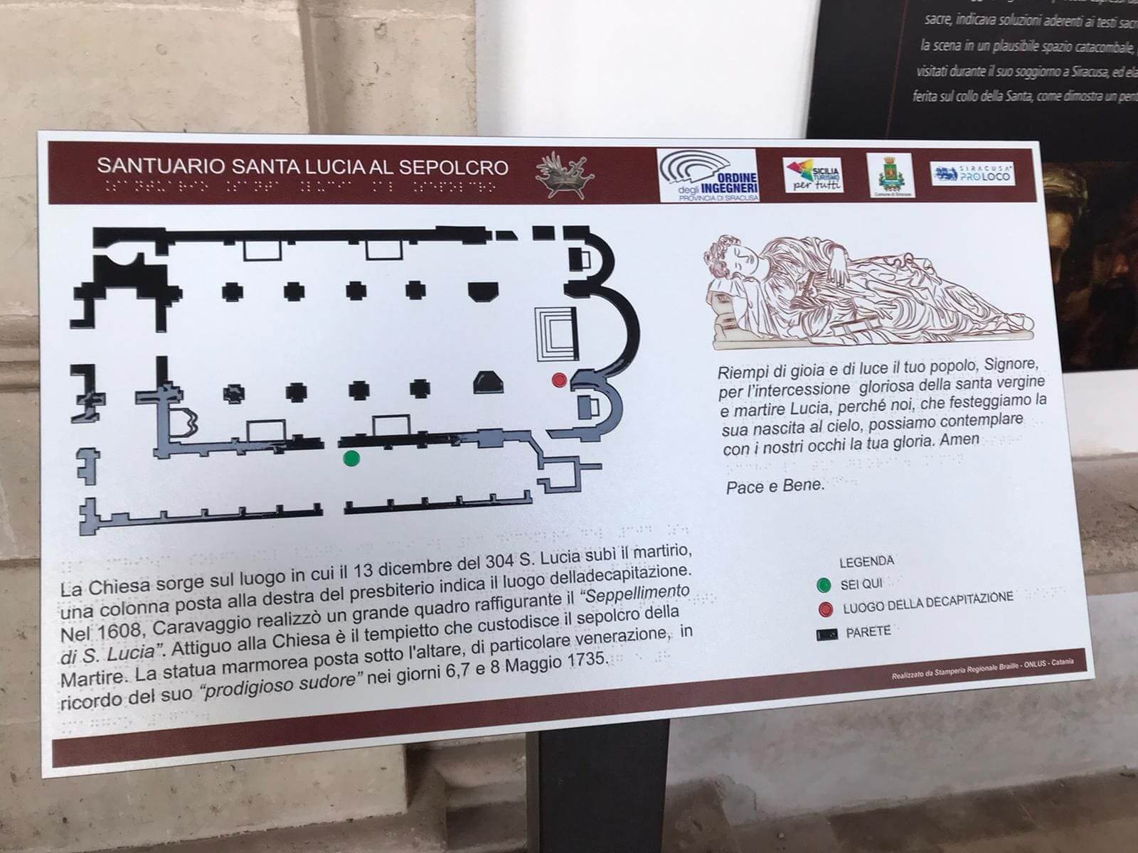 Mappa tattile del Santuario di Santa Lucia al Sepolcro con pianta della chiesa e indicazione del luogo del martirio.